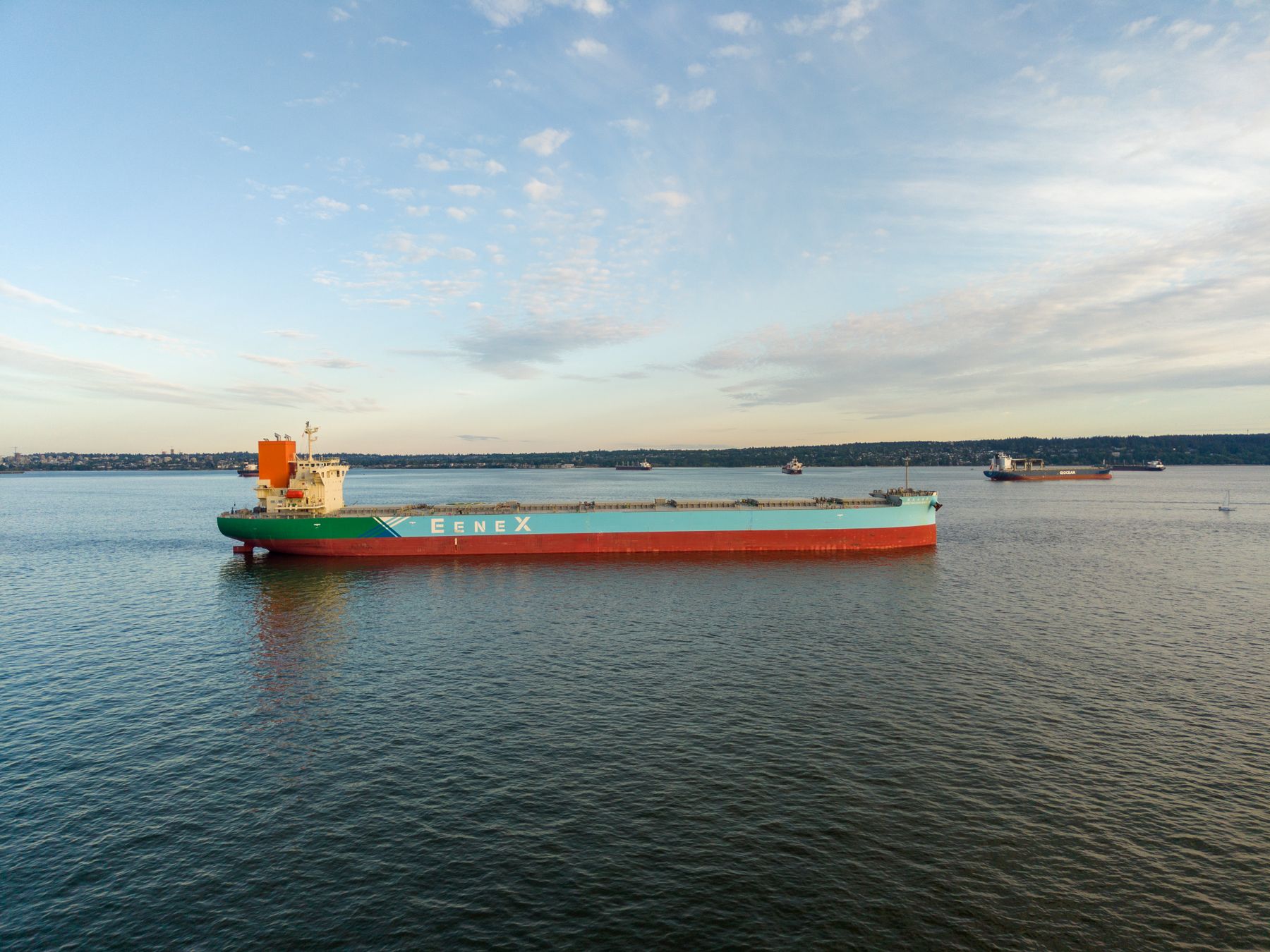 Cargo ship underway in a bay